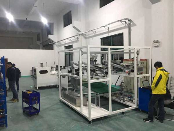 自動化枕頭縫制充絨縫口真空包裝設(shè)備