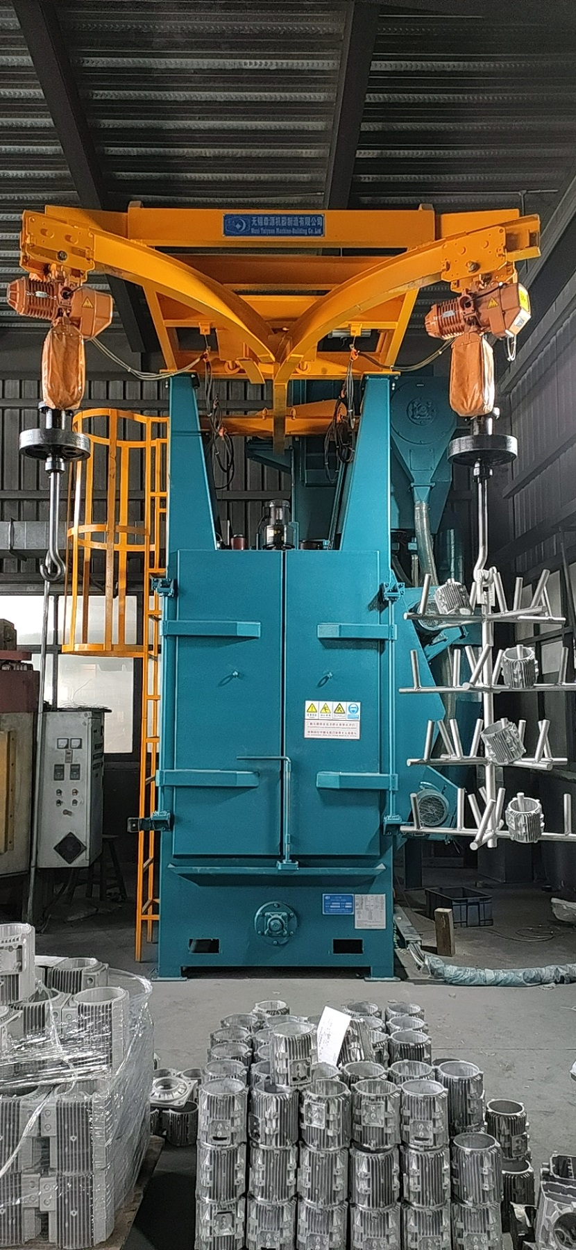 無(wú)錫泰源吊掛式全自動(dòng)拋丸清理機(jī)